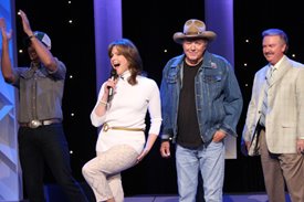 Luke Bryan, Lorianne Crook, Bobby Bare and Charlie Chase (left to right) on stage after the show.
Copyright Jim Owens Entertainment 2008. Photo by Karen Will Rogers.