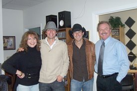 Lorianne and Charlie visit with Stokes Nielson and Ryder Lee of The Lost Trailers. When they left, Lorianne and Charlie reminded them to "Holler Back!"