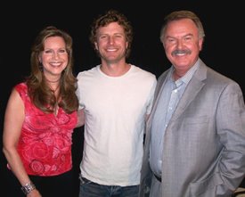 Dierks Bentley is getting to show off his love of bluegrass music in his new album, while Lorianne and Charlie are getting to show off their love of Dierks Bentley in this photo!