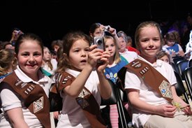 A Brownie Girl Scout takes a picture of her favorite singer, Bucky Covington.
@Jim Owens Entertainment, Inc.
Photo by: Karen Will Rogers