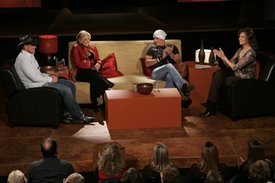 Lorianne Crook interviews Keith Anderson, Julie Roberts and Trent Tomlinson (left to right) on CMA Celebrity Closeup at the Ryman Auditorium during the CMA Music Fest in Nashville, TN. Copyright 2006, Great Amerian Country (GAC). Photographer: Crystal Martin.